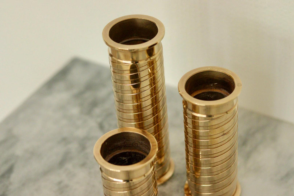 Trio of Mid-Century Swedish Brass Candle Holders