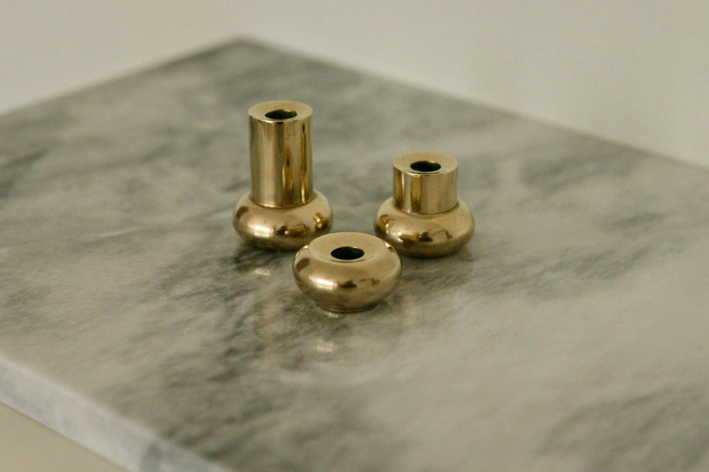 Trio of Mid-Century Swedish Brass Candle Holders