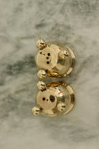 Pair of Mid-Century Swedish Brass Candle Holders