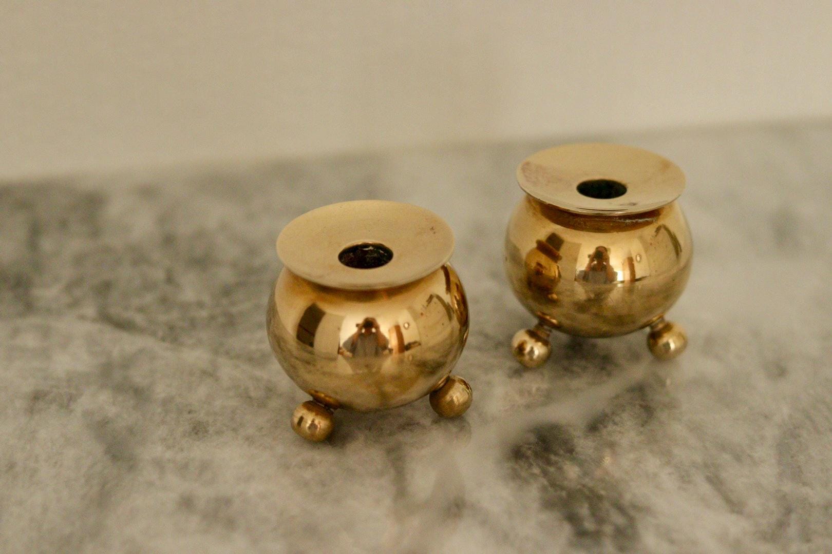 Pair of Mid-Century Swedish Brass Candle Holders