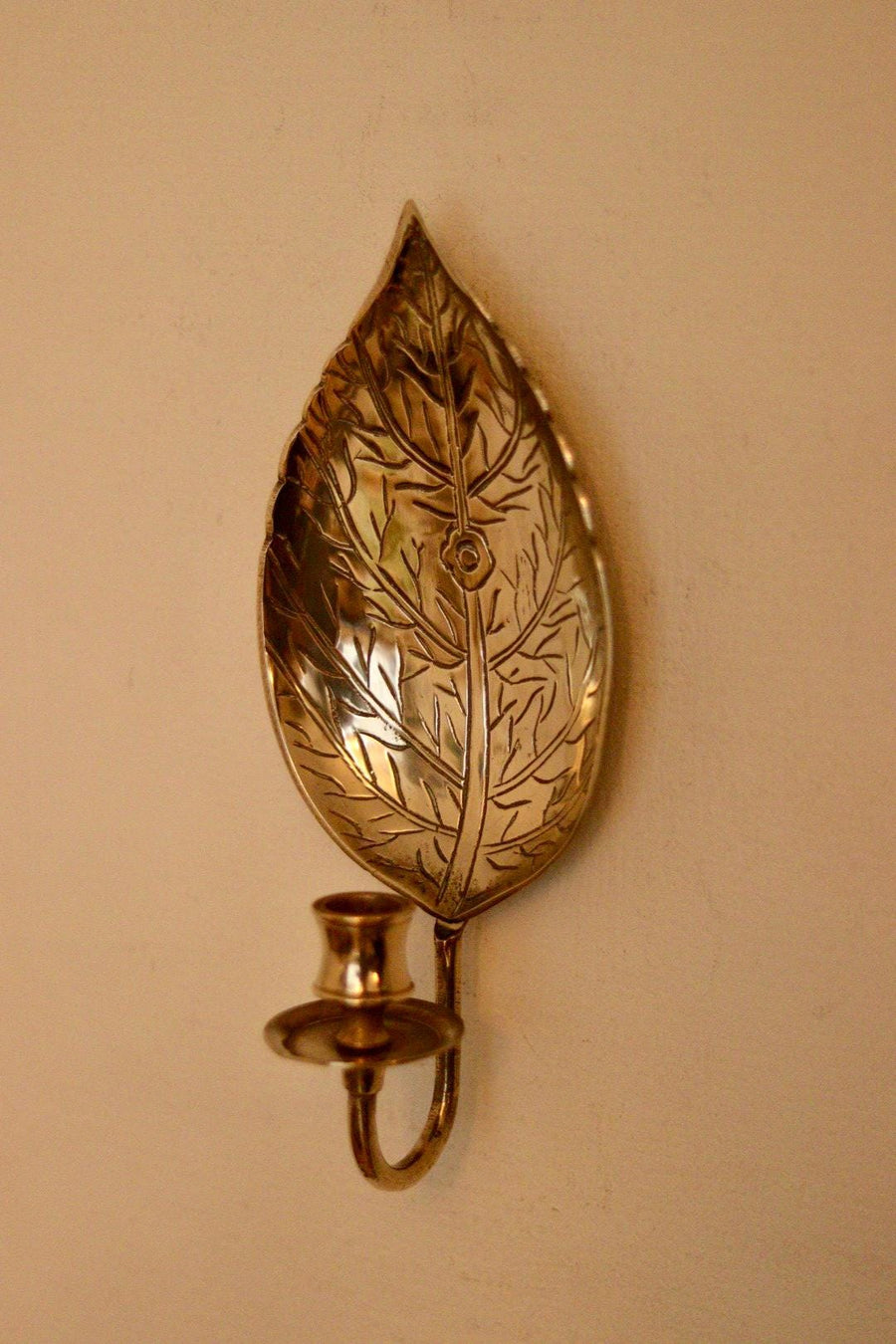 A Pair of Vintage Brass Sconces in Hammered Leaf Shape