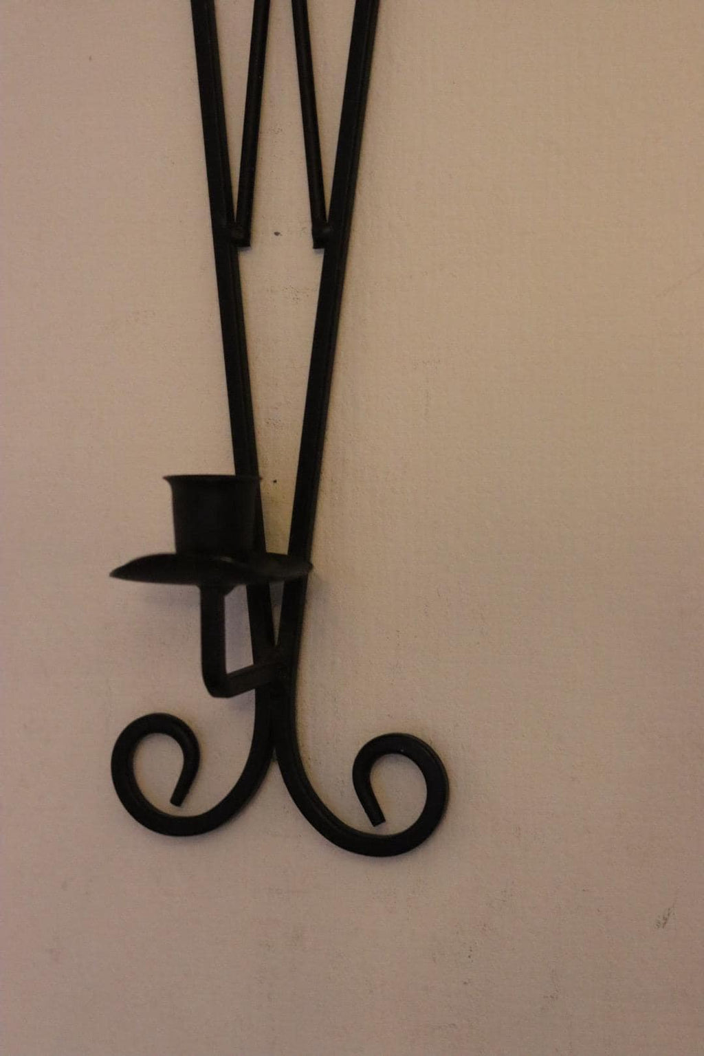Pair of vintage black metal sconces