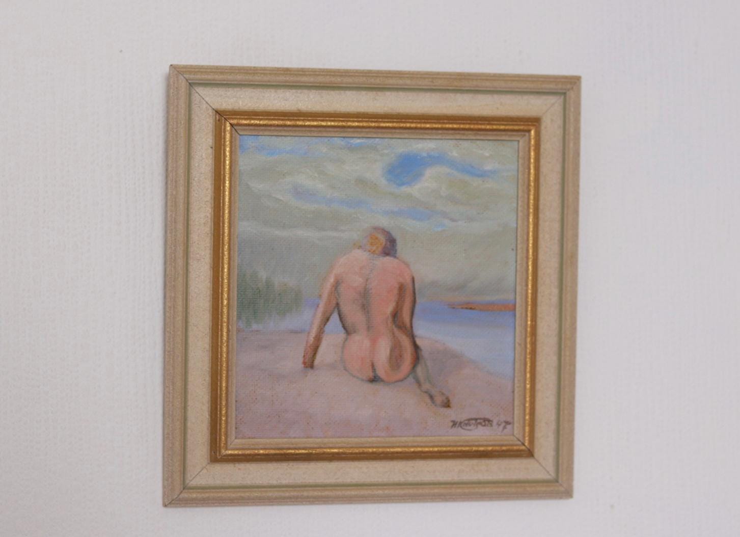“Woman’s Back on the Beach” by H. Knutson