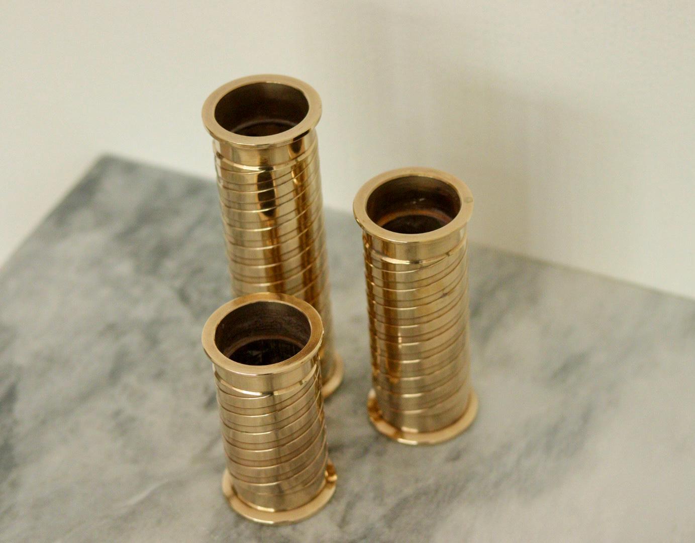 Trio of Mid-Century Swedish Brass Candle Holders