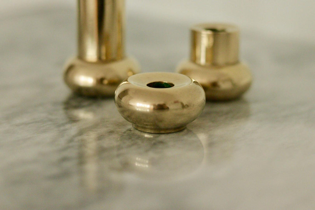 Trio of Mid-Century Swedish Brass Candle Holders