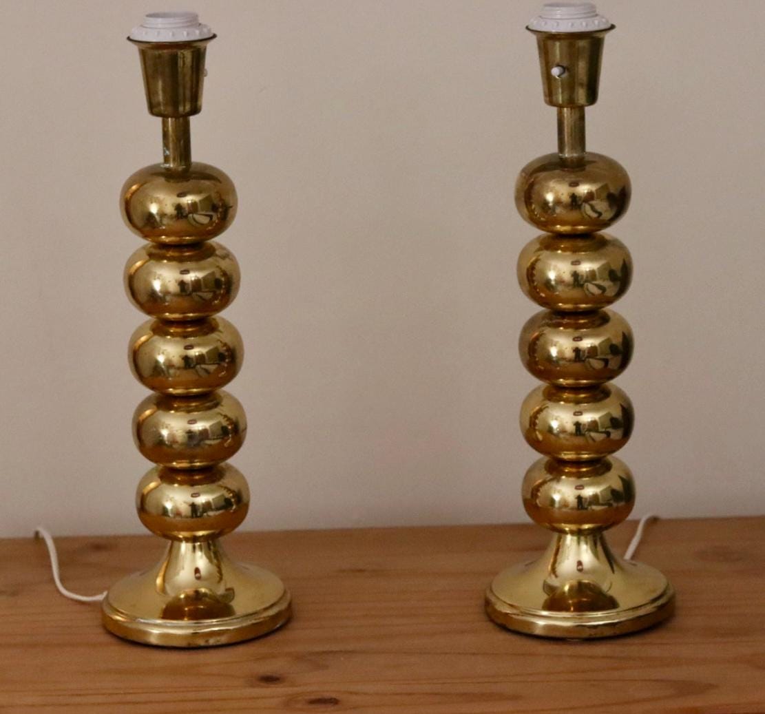 Pair of Tall Mid Century Swedish Brass Bobbin lamps by Aneta