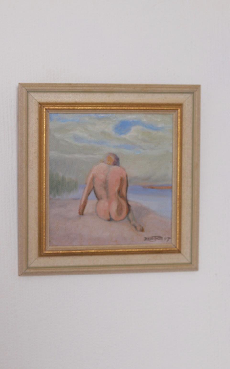 “Woman’s Back on the Beach” by H. Knutson