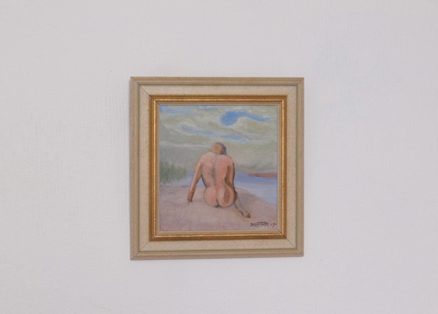 “Woman’s Back on the Beach” by H. Knutson
