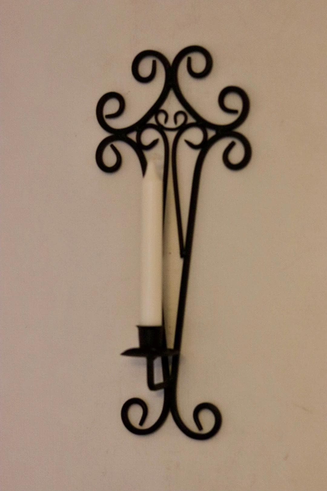 Pair of vintage black metal sconces