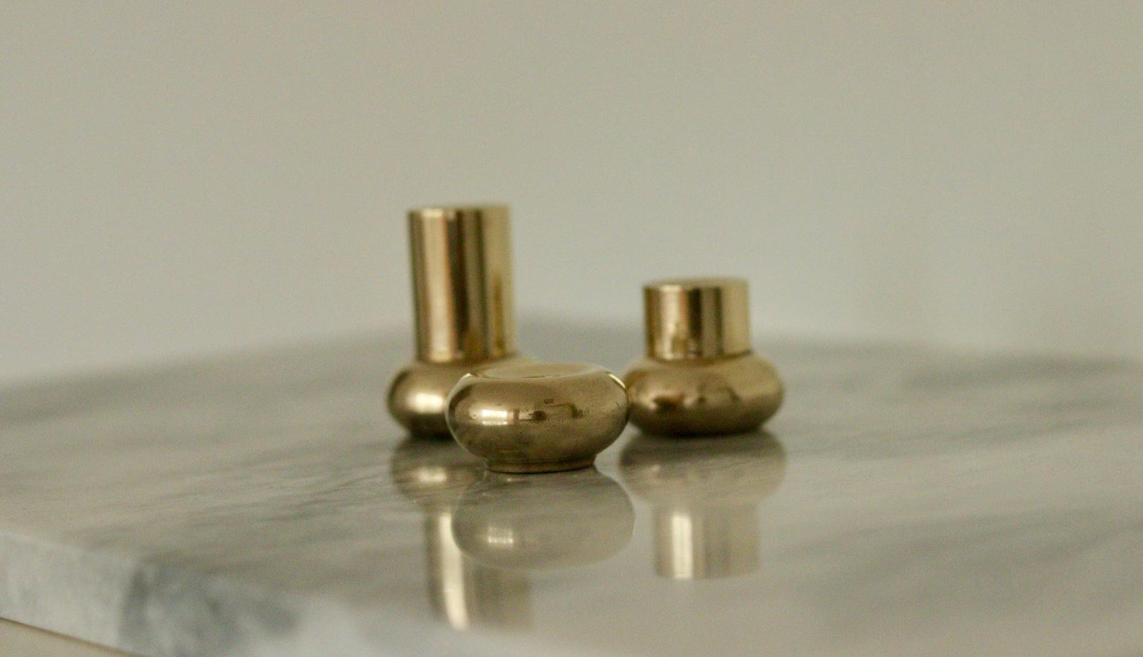 Trio of Mid-Century Swedish Brass Candle Holders