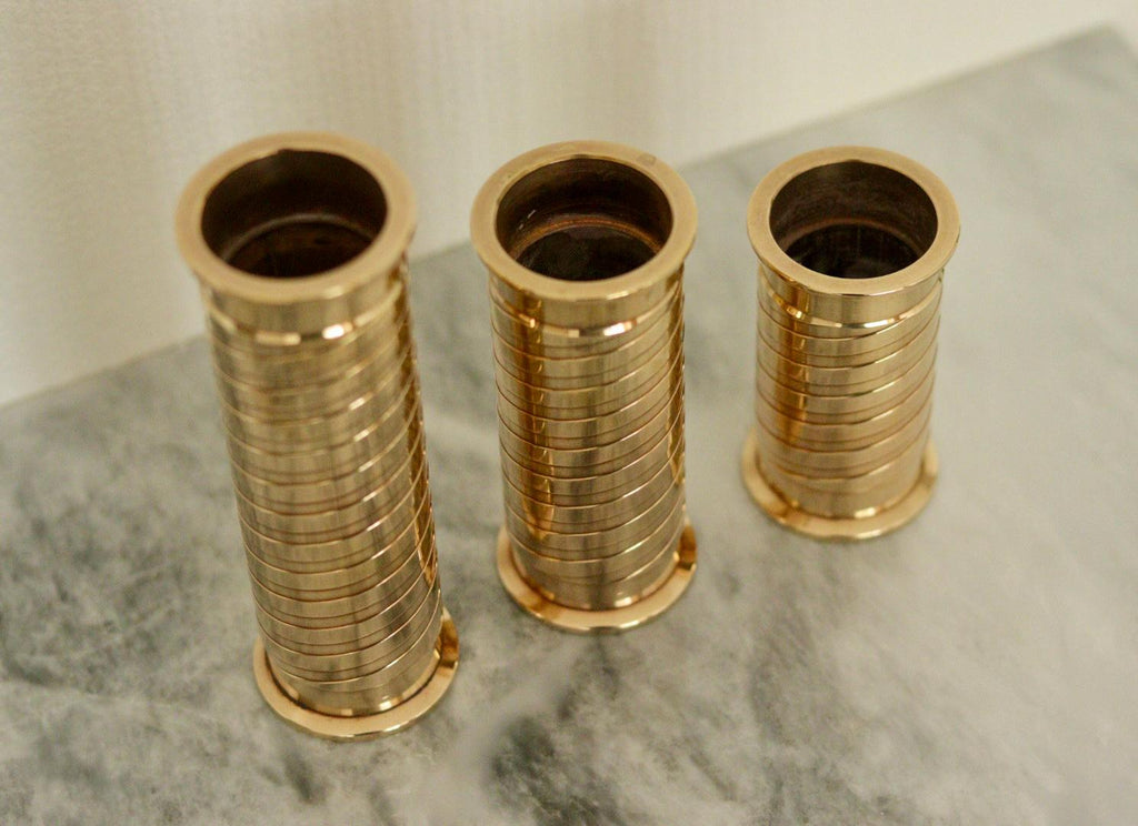 Trio of Mid-Century Swedish Brass Candle Holders