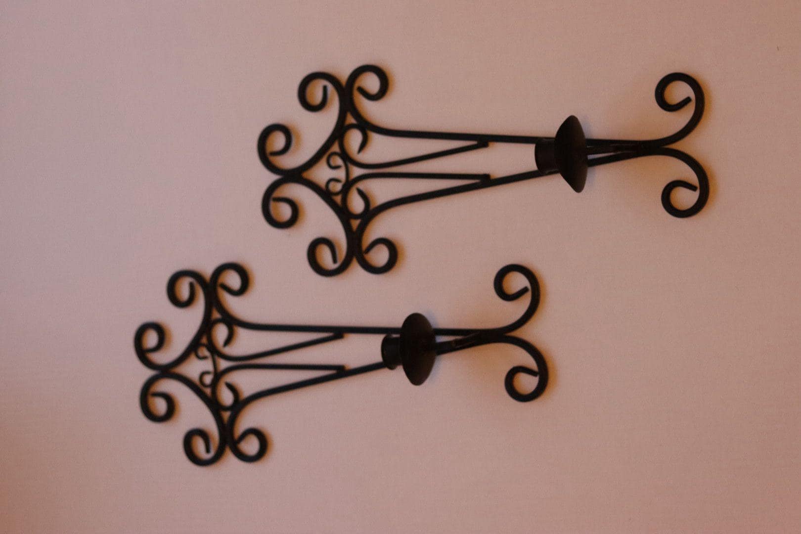 Pair of vintage black metal sconces