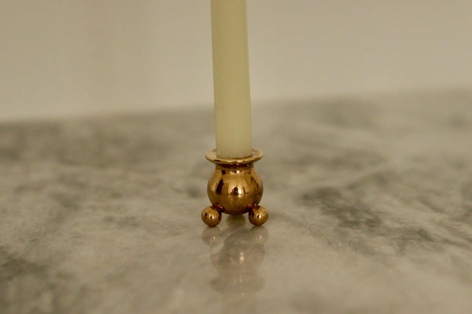 Pair of Mid-Century Swedish Brass Candle Holders