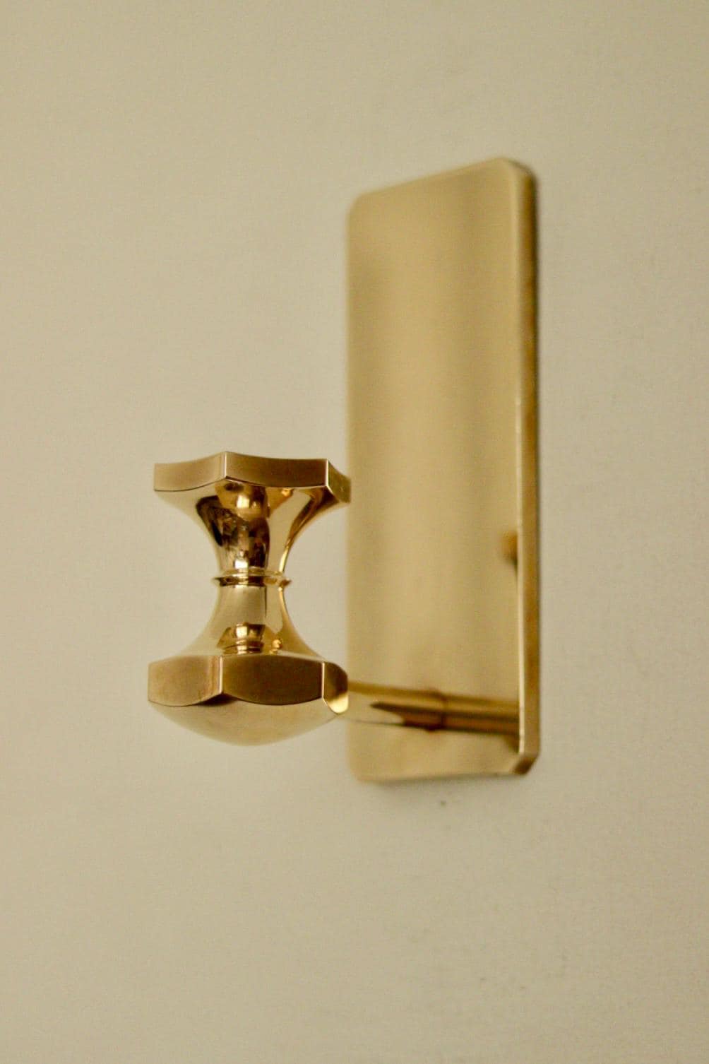 1988,Single Mid‑Century Swedish brass sconce by Gusum