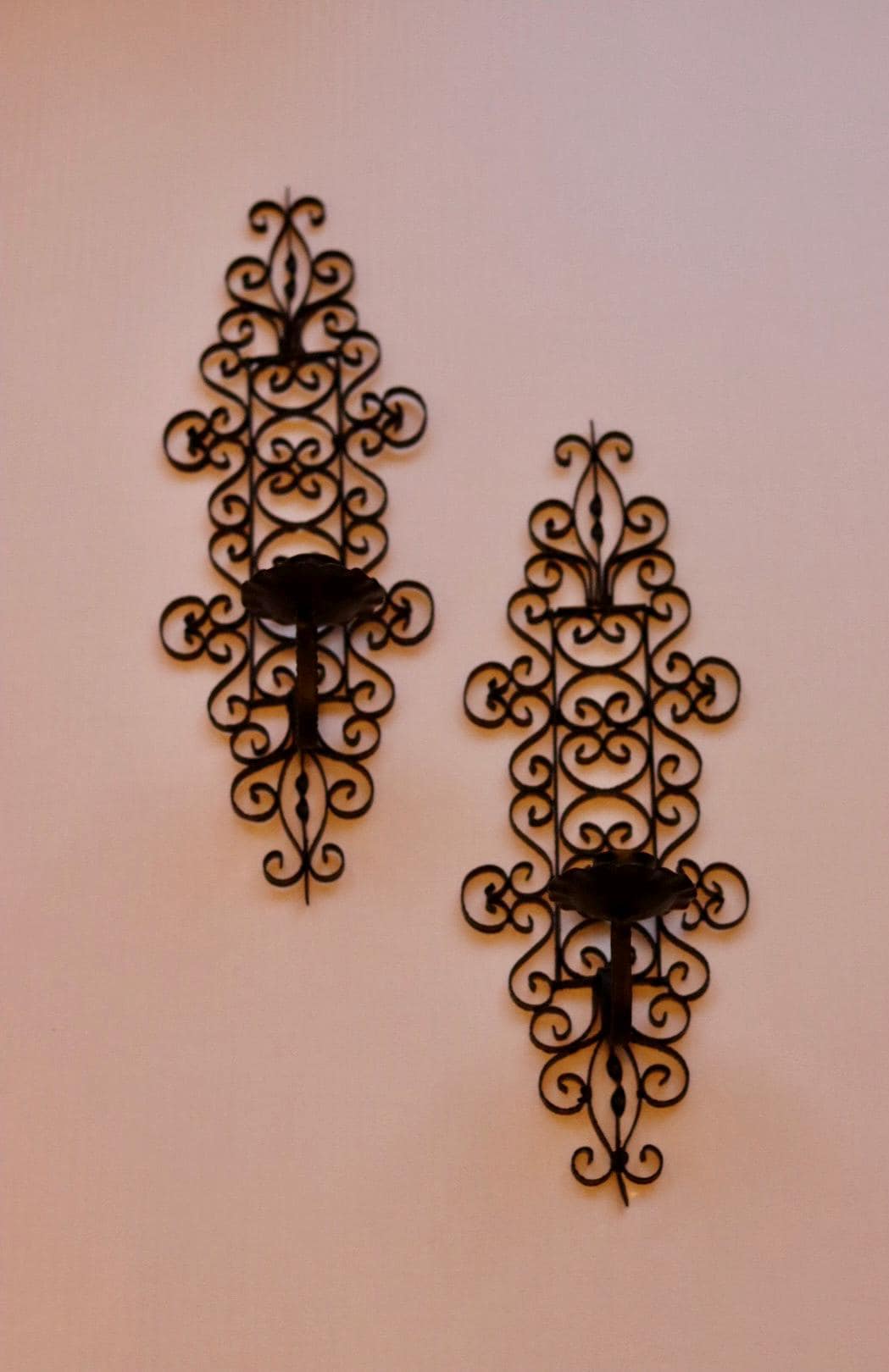 Pair of vintage black metal sconces