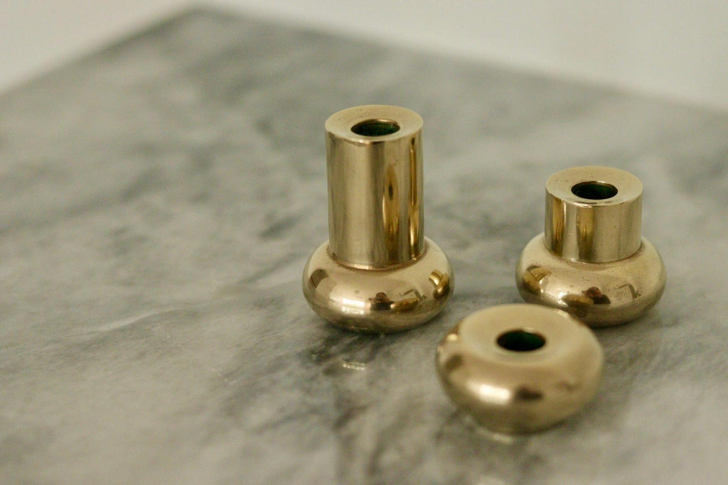 Trio of Mid-Century Swedish Brass Candle Holders