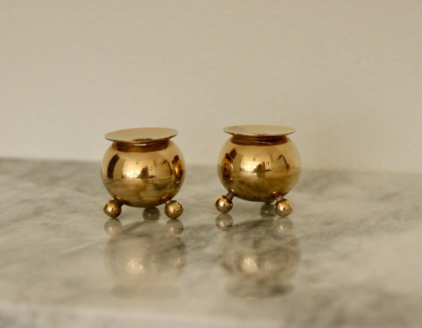 Pair of Mid-Century Swedish Brass Candle Holders